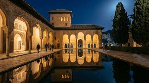 Maximize Alhambra Night Tour Attendance Revenue Now! Alhambra Night Tour at night, glowing architecture.